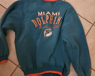 Large sweater from the '90s, 
$40  Miami dolphins 