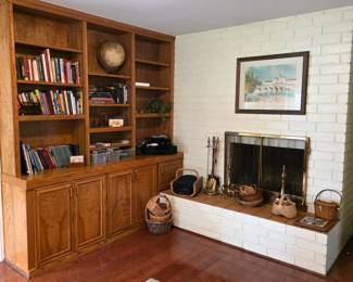 Books, vintage books, Sony 5-disc CD changer, Sony DVD player, DirecTV receiver, baskets