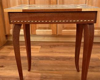 Vintage Italian marquetry inlaid table with music box.