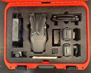 DJI Mavic Pro Drone. This set includes a DJI Mavic Pro drone, securely stored in a durable orange Nanuk 920 hard case. The Nanuk 920 case measures 14 inches high by 17 inches long by 7.5 inches deep and features custom foam inserts to securely organize included accessories.

Includes:
DJI Mavic Pro drone
Nanuk 920 protective case (orange)
Remote controller
2 intelligent flight batteries
Battery charger and cables
Propellers (attached)
User manuals and quick start guides
Additional accessories as shown