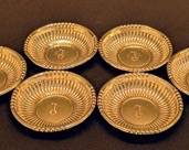 Set of 6 Vintage Wallace Sterling Silver Nut Cups

This set includes 6 elegant Wallace sterling silver nut cups, each featuring a classic ribbed design and intricate monogram at the center. Each cup measures approximately 3.5 inches in diameter, with a combined total weight of 239 grams.

Features:

Set of 6 matching nut cups
Sterling silver, marked "WALLACE STERLING 4007" on the underside
Classic ribbed pattern with monogrammed center
Each cup measures 3.5 inches in diameter
Total weight: 239 grams
See pictures for more details.