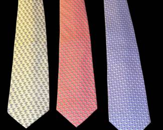 Set of 3 Vineyard Vines Neck Ties with Nautical and Palm Tree Patterns

This set includes three Vineyard Vines neck ties, each featuring distinctive all-over patterns. The set consists of a yellow tie with a palm tree motif, a pink tie with a sailboat design, and a lavender tie with a fish pattern. Each tie is labeled "vineyard vines martha's vineyard" on the reverse side.

Features:
Set of 3 neck ties
Palm tree, sailboat, and fish patterns
Distinctive Vineyard Vines branding
Classic width and styling