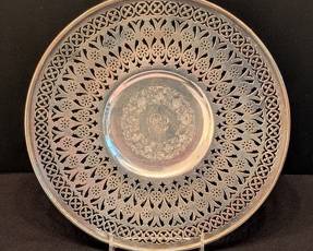Vintage Meriden Britannia Pierced Sterling Silver Plate 
Beautiful Meriden Britannia pierced sterling silver plate featuring intricate floral cutout designs and a monogram at the center surrounded by an engraved floral wreath. This plate measures approximately 10.5 inches in diameter and weighs 352 grams. The base is marked "STERLING 145" with the Meriden Britannia hallmark.
Features:
Intricate pierced floral pattern
Center floral engraved wreath with monogram
Marked: STERLING 145, Meriden Britannia hallmark
Diameter: 10.5 inches
Weight: 352 grams
