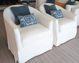 Pair of Essentials for Living Stitch and Hand Swivel Club Chairs

Pair of Essentials for Living Stitch and Hand Swivel club chairs in a light fabric. Each chair comes with a blue back pillow and a coordinating patterned pillow. Chairs measure approximately 31 inches wide, 28 inches deep, 20 inches high to the seat, and 32 inches high to the back. One chair has a small spot on the lower front fabric as shown in the photos. Modern design makes these suitable for a contemporary living room or lounge area.

Features:

Pair of swivel club chairs
Includes pillows as shown
Dimensions: 31" W x 28" D x 32" H