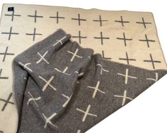 Hawkins New York Wool Blend Throw Blanket 

A Hawkins New York wool blend throw blanket, measuring 70 x 47 inches. Features a reversible design with cross patterns in neutral tones. Made in Lithuania from 88% wool and 12% cotton for a soft, warm feel. Suitable for use as a cozy accent on beds, sofas, or chairs.

Details:

Size: 70 x 47 inches
88% wool, 12% cotton
Reversible cross pattern design
Made in Lithuania