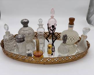 Antique and vintage perfume bottles and tray.