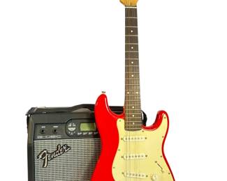 A Vintage SQUIER Mini Stratocaster by FENDER Guitar & FENDER Amp
