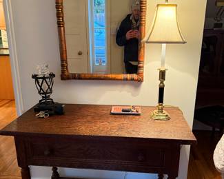 Antique tables and mirrors