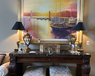 Henredon Ottoman (A), Henredon Ottoman (B), Henredon Ornate Stone Top Console Table, Chapman Brass Lamp Pair, Tiffany & Co Candlestick Set, Louis Fabian Sailboat Painting   