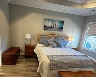 King size bed with adjustable base, headboard, two side tables made of zapote wood, lamps, cedar chest, artwork 