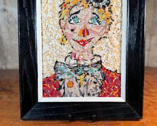 “Clown”, an original mixed media work of art by artist, Armande Cushway. This piece in particular won 2nd place in the USF art show, with Howard Hack taking first. This piece measures in frame, 18” H x 14” W.

