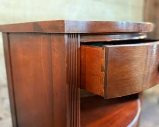 This lot features a Georgian-style mahogany nightstand with a single drawer that measures, 27” H x 18” W x 14” D.

