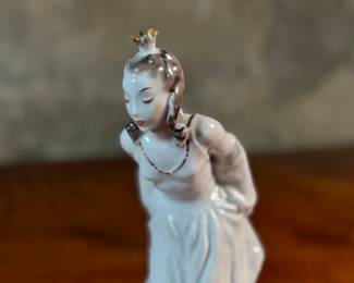"Princess and the Frog", a sculpture designed by Lore Friedrich-Gronau for Rosenthal in the 1960s. Made in Germany and measures, 8” H x 4” W x 5” D.

