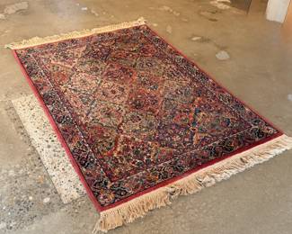 This lot features an authentic Karastan rug that measures, 72” H x 51” W. This rug comes from a pet friendly home.

