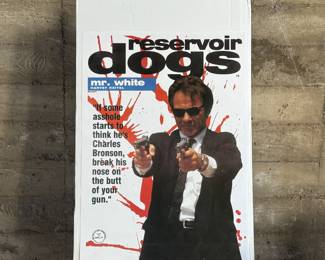 This lot features a Reservoir Dogs movie poster that measures, 34” H x 24” W.

