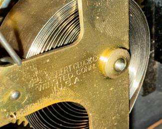 "Star", an antique mantel clock manufactured by W.M.L. Gilbert that measures, 10.75” H x 15.75” W x 7.25” D. Comes with key and pendulum in working condition.

