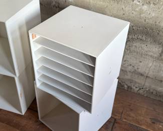 This lot features a set of four (4) modular storage cubes from Finland company, Palaset. Designed by Ristomatti Ratia, the son of Marimekko’s founder, Armi Ratia. Fabricated from a hard, durable polystyrene, this versatile system is ideal for offices, playrooms, and mudrooms, yet easily stylish enough for the living room. Each cube measures, 13.5” H x 13.5” W x 13.5” D.

