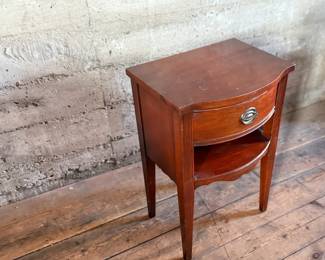 This lot features a Georgian-style mahogany nightstand with a single drawer that measures, 27” H x 18” W x 14” D.

