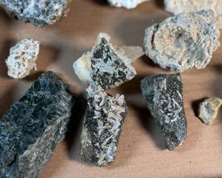 This lot features a curated collection of various rocks and minerals.

