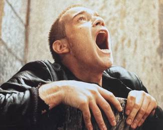 This lot features a Trainspotting movie poster that measures, 25” H x 35” W.

