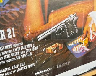 This lot features a Pulp Fiction movie poster that measures, 36” H x 24” W.

