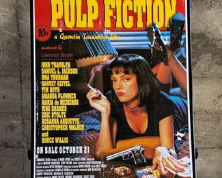 This lot features a Pulp Fiction movie poster that measures, 36” H x 24” W.

