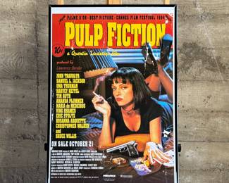 This lot features a Pulp Fiction movie poster that measures, 36” H x 24” W.


