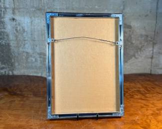 "Silverpoint #104, Feather", a limited edition lithograph by listed artist, Howard Hack. Edition 22/135, pencil signed, and measures in frame, 15” H x 11” W. Howard Edwin Hack (July 6, 1932 – June 11, 2015) was an American representational painter and graphic artist, with works in numerous museum collections. Known for an innovative approach to a variety of media, as well as use of traditional oil paints, Hack began working in the late 1940s.

