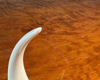 This lot features a pair of Lenox Lyre candle holders that measure, 8” H x 5” W x 3.5” D. One of them has a tiny chip on one end shown in photos that isn’t noticeable.

