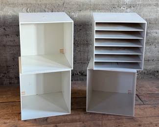 This lot features a set of four (4) modular storage cubes from Finland company, Palaset. Designed by Ristomatti Ratia, the son of Marimekko’s founder, Armi Ratia. Fabricated from a hard, durable polystyrene, this versatile system is ideal for offices, playrooms, and mudrooms, yet easily stylish enough for the living room. Each cube measures, 13.5” H x 13.5” W x 13.5” D.

