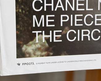 This lot features a Trainspotting movie poster that measures, 25” H x 35” W.

