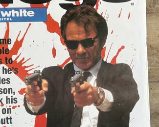 This lot features a Reservoir Dogs movie poster that measures, 34” H x 24” W.


