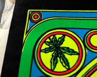 This lot features a vintage Cypress Hill "Stoned Is the Way of the Walk" black light poster. This poster features a skull with a cannabis afro smoking a joint and is designed with psychedelic colors and intended to glow under ultraviolet light. This poster measures, 34.5” H x 23” W.

