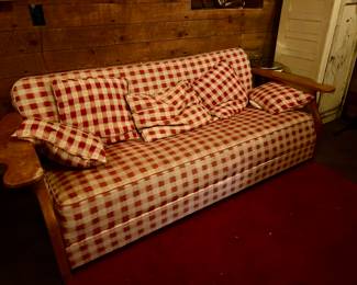 wood framed red checkered couch
