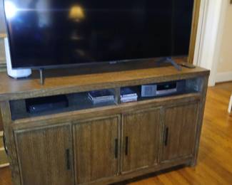 TV cabinet, entertainment center, weathered oak finish, black hardware, 60" flat screen TV