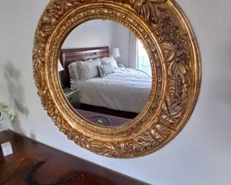 gold porthole mirror