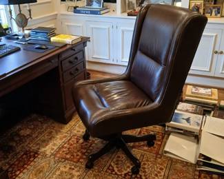Dark brown leather executive office chair no arms, mahogany executive desk, 