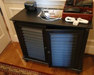 Black painted shuttered cabinet