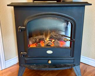 Electric faux fireplace heater