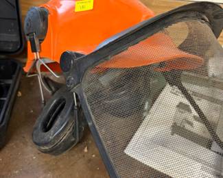 Hard hat and ear protectors along with screen to,protect your face from flying debris