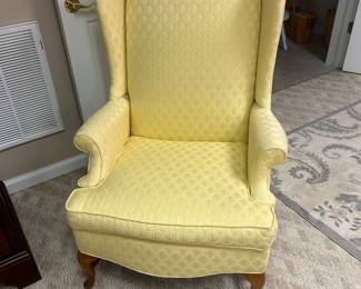 Great shape pale yellow wingback chair.