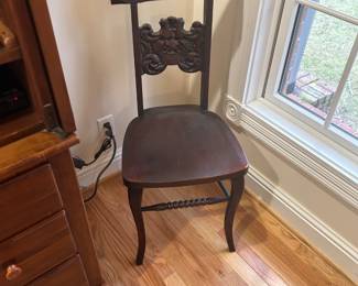 Antique face chair, unique and rare find.