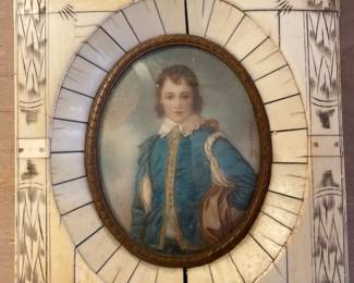 Signed portrait in bone frame