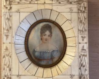 Signed portrait in bone frame