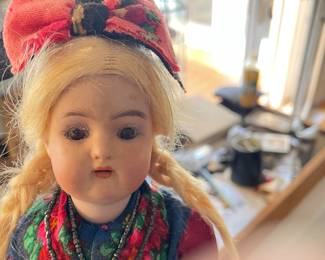 Antique German doll with original costume.  Krammer Reinhardt mark