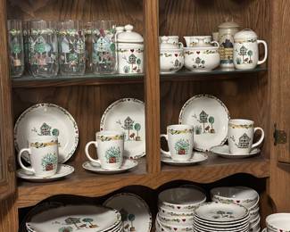 Large set of birdhouse dinnerware