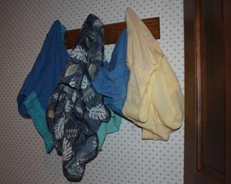 Bathing suits in basement by sauna
