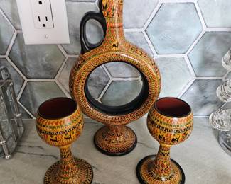 'Hittite' style wine decantur and two wine cups, highly detailed painted works, signed piece by renowned Turkish artist Chez Galip.  Absolutely stunning condition.