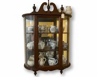 Vintage Curved Wall Glass Curio Cabinet with Ceramic Pitchers and Creamers