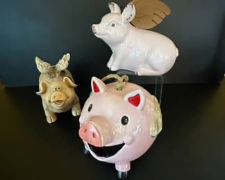 Collection of Three Decorative Pig Figurines with Wings 